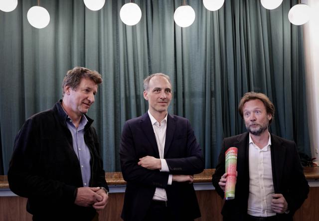 (L-R) The Ecologists senator Yannick Jadot, co-president of French center-left party Place publique (PP) Raphael Glucksmann, and President of Socialistes et Apparentes parliamentary group Boris Vallaud arrive for a debate session organised by "Ensemble Sur Nos Territoires" association in Montreuil, near Paris on April 11, 2026. (Photo by STEPHANE DE SAKUTIN / AFP)