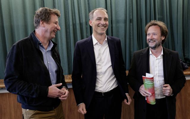 (L-R) The Ecologists senator Yannick Jadot, co-president of French center-left party Place publique (PP) Raphael Glucksmann, and President of Socialistes et Apparentes parliamentary group Boris Vallaud arrive for a debate session organised by "Ensemble Sur Nos Territoires" association in Montreuil, near Paris on April 11, 2026. (Photo by STEPHANE DE SAKUTIN / AFP)
