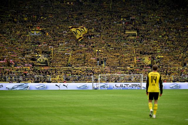 Dortmund's German forward #14 Maximilian Beier leaves the pitch after the German first division Bundesliga football match between Borussia Dortmund and Bayer Leverkusen in Dortmund, western Germany, on April 11, 2026. (Photo by INA FASSBENDER / AFP) / DFL REGULATIONS PROHIBIT ANY USE OF PHOTOGRAPHS AS IMAGE SEQUENCES AND/OR QUASI-VIDEO