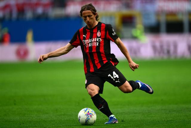 AC Milan's Croatian midfielder #14 Luka Modric shoots the ball during the Italian Serie A football match between AC Milan and Udinese at the San Siro stadium in Milan on April 11, 2026. (Photo by MARCO BERTORELLO / AFP)