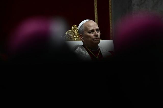 Pope Leo XIV presides over a prayer vigil for peace inside St. Peter's Basilica at the Vatican on April 11, 2026. (Photo by Filippo MONTEFORTE / AFP)