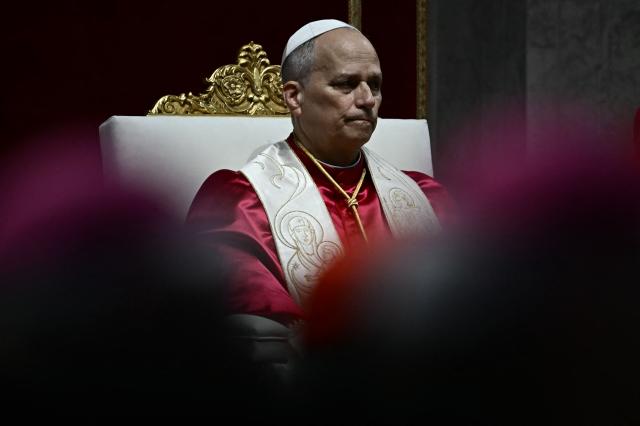 Pope Leo XIV presides over a prayer vigil for peace inside St. Peter's Basilica at the Vatican on April 11, 2026. (Photo by Filippo MONTEFORTE / AFP)