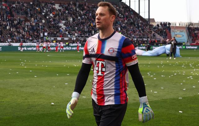 Bayern Munich's German goalkeeper #01 Manuel Neuer is pictured after the warm up prior to the German first division Bundesliga football match between FC St Pauli and FC Bayern Munich in Hamburg, northern Germany, on April 11, 2026. (Photo by Ibo OT / AFP) / DFL REGULATIONS PROHIBIT ANY USE OF PHOTOGRAPHS AS IMAGE SEQUENCES AND/OR QUASI-VIDEO