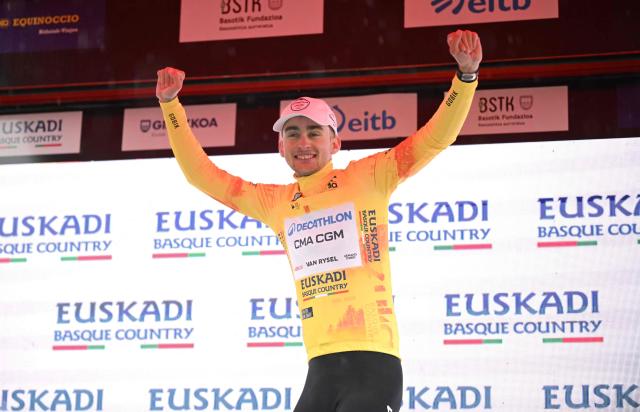 Winner Team Decathlon CMA CGM's French rider Paul Seixas celebrates on the podium of the 2026 Basque Country's Itzulia cycling tour after the sixth and last stage, in Bergara, on April 11, 2026. (Photo by ANDER GILLENEA / AFP)