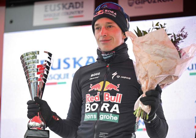 Second placed Team Bora's German rider Florian Lipowitz celebrates on the podium of the 2026 Basque Country's Itzulia cycling tour after the sixth and last stage, in Bergara, on April 11, 2026. (Photo by ANDER GILLENEA / AFP)