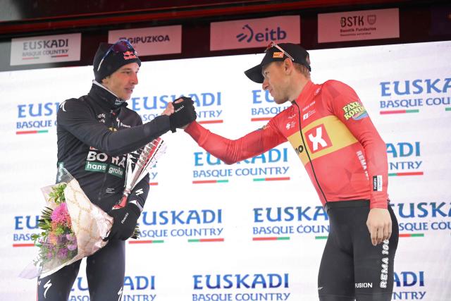Second placed (L) Team Bora's German rider Florian Lipowitz and third placed Team Uno-X's Norwegian rider Tobias Johannessen celebrate on the podium of the 2026 Basque Country's Itzulia cycling tour after the sixth and last stage, in Bergara, on April 11, 2026. (Photo by ANDER GILLENEA / AFP)