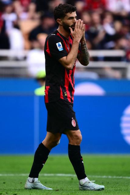 AC Milan American midfielder #11 Christian Pulisic reacts during the Italian Serie A football match between AC Milan and Udinese at the San Siro stadium in Milan, northern Italy, on April 11, 2026. (Photo by MARCO BERTORELLO / AFP)