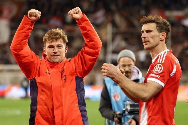 Bayern Munich's German midfielder #06 Joshua Kimmich (L) and Bayern Munich's German midfielder #08 Leon Goretzka react after the German first division Bundesliga football match between FC St Pauli and FC Bayern Munich in Hamburg, northern Germany, on April 11, 2026. (Photo by Ibo OT / AFP) / DFL REGULATIONS PROHIBIT ANY USE OF PHOTOGRAPHS AS IMAGE SEQUENCES AND/OR QUASI-VIDEO