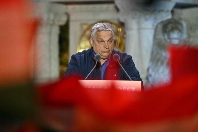 Hungarian Prime Minister Viktor Orban addresses supporters during his campaign closing rally at Buda Castle in Budapest on April 11, 2026, on the eve of the general election in Hungary. (Photo by Attila KISBENEDEK / AFP)