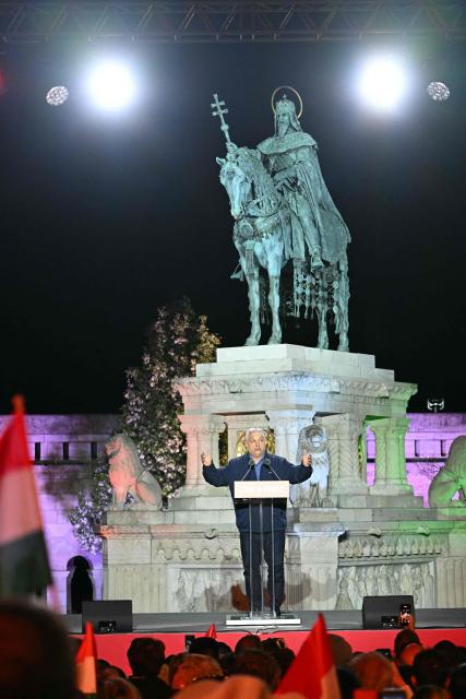 Hungarian Prime Minister Viktor Orban addresses supporters during his campaign closing rally at Buda Castle in Budapest on April 11, 2026, on the eve of the general election in Hungary. (Photo by Attila KISBENEDEK / AFP)