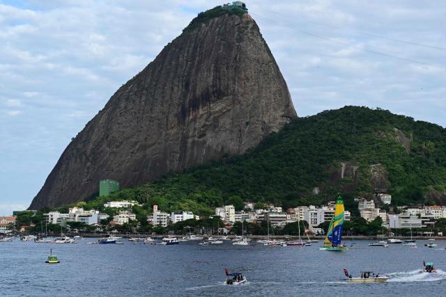 Brazil’s team arrives for the third race after missing the earlier events due to technical problems during the Rio 2026 SailGP race day 1, in Guanabara Bay in Rio de Janeiro, Brazil on April 11, 2026. (Photo by Pablo PORCIUNCULA / AFP)