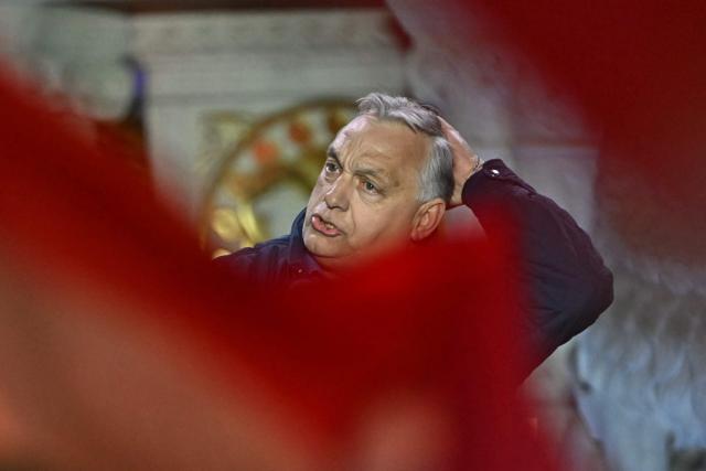 Hungarian Prime Minister Viktor Orban addresses supporters during his campaign closing rally at Buda Castle in Budapest on April 11, 2026, on the eve of the general election in Hungary. (Photo by Attila KISBENEDEK / AFP)
