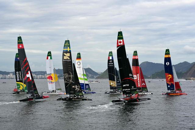 Competitors get ready for the fourth race during the Rio 2026 SailGP day 1, in Guanabara Bay in Rio de Janeiro, Brazil on April 11, 2026. (Photo by Pablo PORCIUNCULA / AFP)