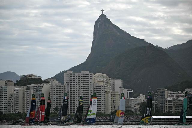 Teams compete during the Rio 2026 SailGP race day 1, in Guanabara Bay in Rio de Janeiro, Brazil on April 11, 2026. (Photo by Mauro PIMENTEL / AFP)