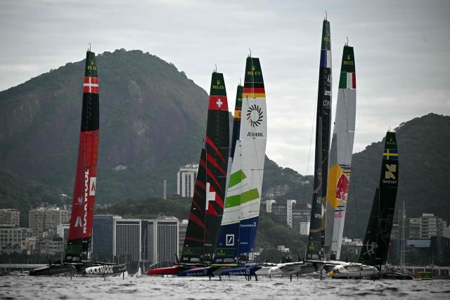 Teams compete during the Rio 2026 SailGP race day 1, in Guanabara Bay in Rio de Janeiro, Brazil on April 11, 2026. (Photo by Mauro PIMENTEL / AFP)