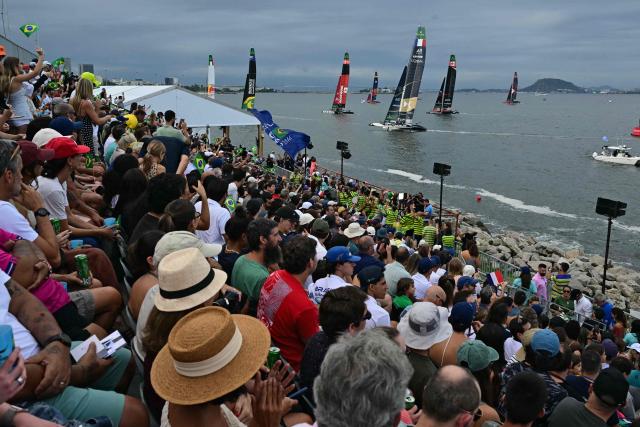Sailing enthusiasts attend the Rio 2026 SailGP race day 1, in Guanabara Bay in Rio de Janeiro, Brazil on April 11, 2026. (Photo by Pablo PORCIUNCULA / AFP)