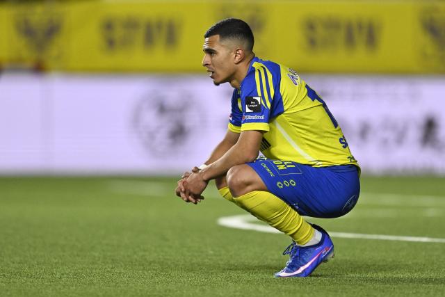 STVV's Moroccan forward #10 Ilias Sebaoui reacts at the end of the Belgian "Pro League" champions' play-off (day 2 out of 10) football match between Sint-Truiden VV and Club Brugge at the Stayen Stadium in Sint-Truiden on April 11, 2026. STVV's Ilias Sebaoui (Photo by Johan Eyckens / Belga / AFP) / Belgium OUT