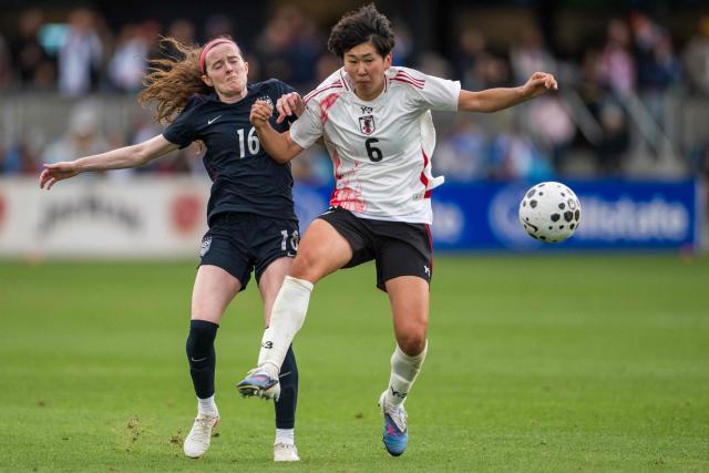 US midfielder #16 Rose Lavelle and Japan defender #06 Toko Koga fight for the ball during an international women's friendly football match between USA and Japan at PayPal Park in San Jose, California, on April 11, 2026. (Photo by Nic Coury / AFP)