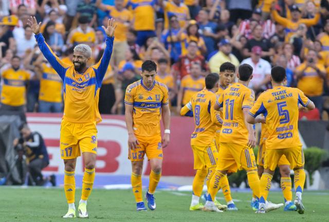 Tigres’ Uruguayan forward #17 Rodrigo Aguirre celebrates after scoring during the Liga MX Clausura tournament football match between Tigres and Guadalajara at the Universitario stadium in San Nicolas de los Garza, state of Nuevo Leon, Mexico, on April 11, 2026. (Photo by Julio Cesar AGUILAR / AFP)