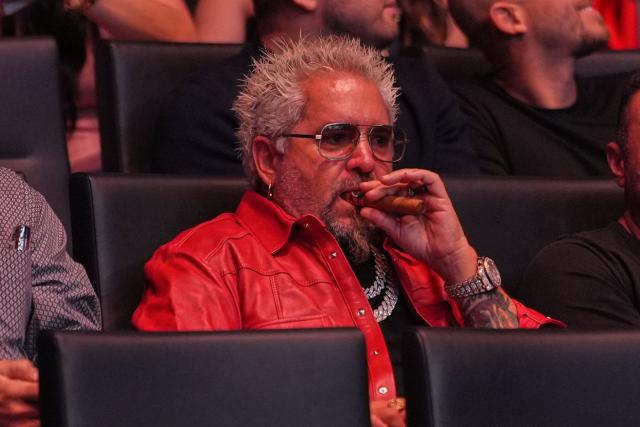 US restauranteur Guy Fieri arrives before President Donald Trump to attend UFC 327 at Kaseya Center, in Miami, on April 11, 2026. (Photo by Julia Demaree Nikhinson / POOL / AFP)