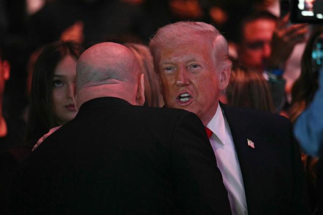 US President Donald Trump chats with UFC CEO and president Dana White before UFC 327: Jiri Prochazka vs Carlos Ulberg at Kaseya Center in Miami, on April 11, 2026. (Photo by Jim WATSON / AFP)