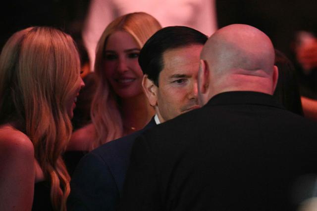 US Secretary of State Marco Rubio chats with UFC CEO and president Dana White before UFC 327: Jiri Prochazka vs Carlos Ulberg at Kaseya Center in Miami, on April 11, 2026. (Photo by Jim WATSON / AFP)