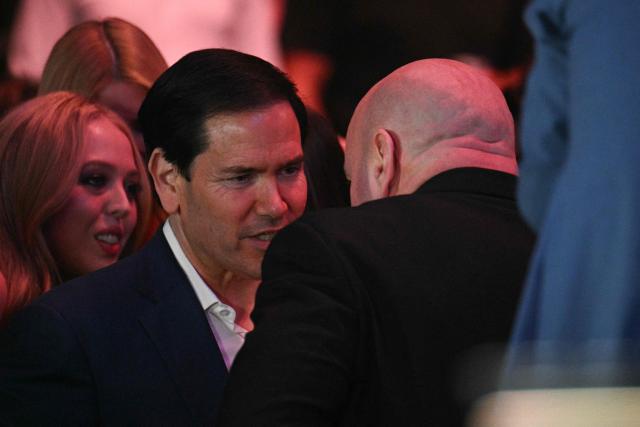 US Secretary of State Marco Rubio chats with UFC CEO and president Dana White before UFC 327: Jiri Prochazka vs Carlos Ulberg at Kaseya Center in Miami, on April 11, 2026. (Photo by Jim WATSON / AFP)