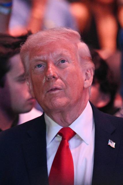 US President Donald Trump attends UFC 327: Jiri Prochazka vs Carlos Ulberg at Kaseya Center in Miami, on April 11, 2026. (Photo by Jim WATSON / AFP)