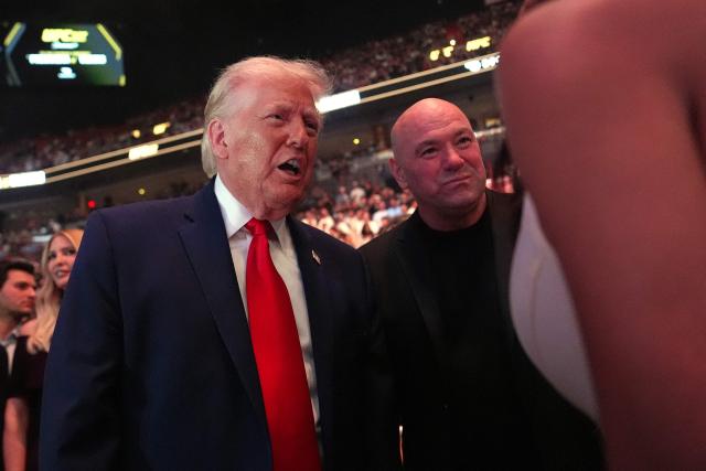 US President Donald Trump speaks with UFC CEO and president Dana White during UFC 327: Jiri Prochazka vs Carlos Ulberg at Kaseya Center in Miami, on April 11, 2026. (Photo by Julia Demaree Nikhinson / POOL / AFP)