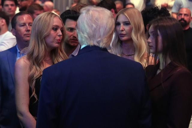 US President Donald Trump speaks with (L-R) Tiffany Trump, Michael Boulos, Ivanka Trump and Arabella Kushner at UFC 327: Jiri Prochazka vs Carlos Ulberg at Kaseya Center in Miami, on April 11, 2026. (Photo by Julia Demaree Nikhinson / POOL / AFP)