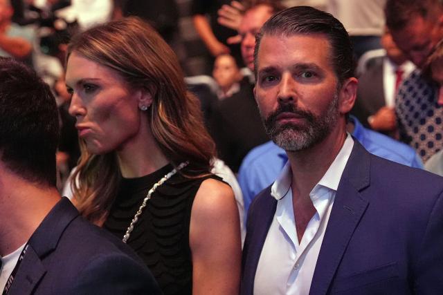 Donald Trump Jr., and Bettina Anderson attend UFC 327: Jiri Prochazka vs Carlos Ulberg at Kaseya Center in Miami, on April 11, 2026. (Photo by Julia Demaree Nikhinson / POOL / AFP)