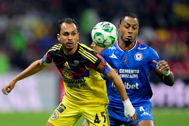 America's Brazilian midfielder #45 Lima and Cruz Azul's Colombian defender #04 Willer Ditta fight for the ball during the Liga MX Clausura tournament football match between America and Cruz Azul at the Azteca Stadium in Mexico City on April 11, 2026. (Photo by Alfredo ESTRELLA / AFP)