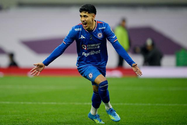 Cruz Azul's defender #03 Omar Campos celebrates after scoring the equalising goal during the Liga MX Clausura tournament football match between America and Cruz Azul at the Azteca Stadium in Mexico City on April 11, 2026. (Photo by Alfredo ESTRELLA / AFP)