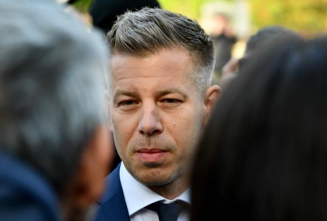 Peter Magyar, leader of the pro-European conservative TISZA party, talks with journalists after casting his ballot at a polling station in Budapest during a general election in Hungary, on April 12, 2026. The vote could end Hungarian Prime Minister Viktor Orban's 16-year stint in power as the EU's longest serving current leader and a self-decribed "thorn" in the bloc's side. (Photo by Ferenc ISZA / AFP)