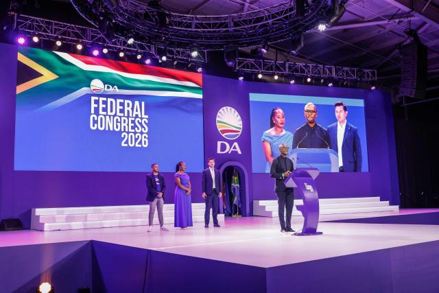 Minister of Communications and Digital Technologies of South Africa and candidate for the federal chairperson of the Democratic Alliance (DA) Solly Malatsi (R) speaks on the second day of the DA Federal Congress at the Gallagher Convention Centre in Midrand on April 12, 2026. (Photo by Ilaria Finizio / AFP)