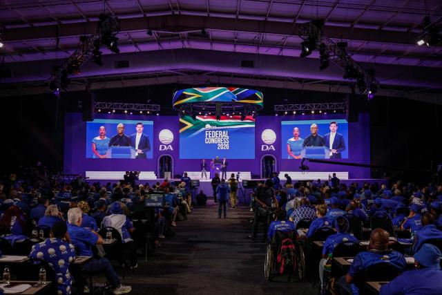 Minister of Communications and Digital Technologies of South Africa and candidate for the federal chairperson of the Democratic Alliance (DA) Solly Malatsi (C) speaks on the second day of the DA Federal Congress at the Gallagher Convention Centre in Midrand on April 12, 2026. (Photo by Ilaria Finizio / AFP)
