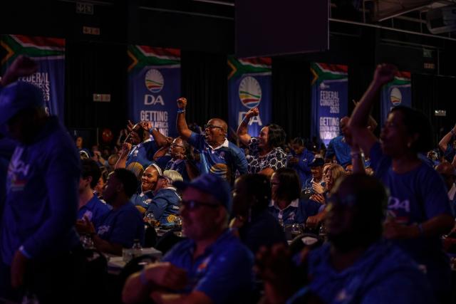 Delegates cheer during the second day of the Democratic Alliance (DA) Federal Congress at the Gallagher Convention Centre in Midrand on April 12, 2026. (Photo by Ilaria Finizio / AFP)