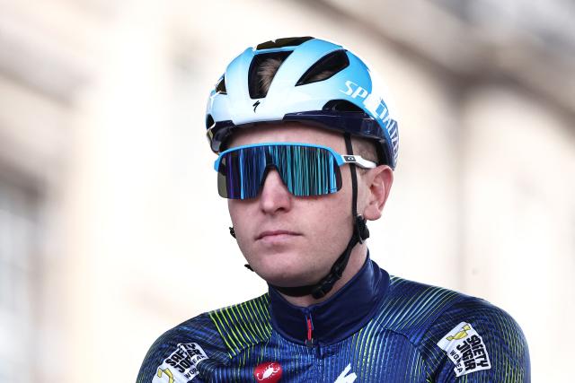 Soudal Quick-Step's Belgian rider Tim Merlier arrives at the start of the 123rd edition of the Paris-Roubaix one-day classic cycling race, 258.3 km between Compiègne and Roubaix, northern France, on April 12, 2026. (Photo by Anne-Christine POUJOULAT / AFP)