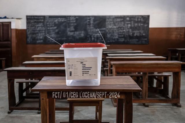 A general view of a ballot box at a primary school serving as a polling station in Cotonou, on April 12, 2026 during Benin's presidential election. (Photo by OLYMPIA DE MAISMONT / AFP)