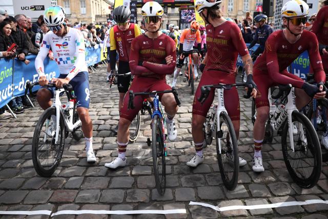 Modern Adventure Pro Cycling's US rider Robin Carpenter (C) waits at the start of the 123rd edition of the Paris-Roubaix one-day classic cycling race, 258.3 km between Compiègne and Roubaix, northern France, on April 12, 2026. (Photo by Anne-Christine POUJOULAT / AFP)