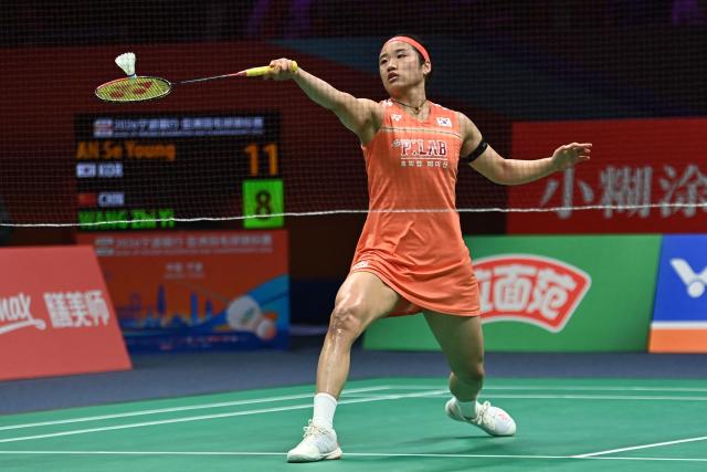 South Korea's An Se-young hits a return to China's Wang Zhiyi during their women's singles final match at the Badminton Asia Championship in Ningbo, eastern China's Zhejiang province on April 12, 2026. (Photo by CN-STR / AFP) / China OUT
