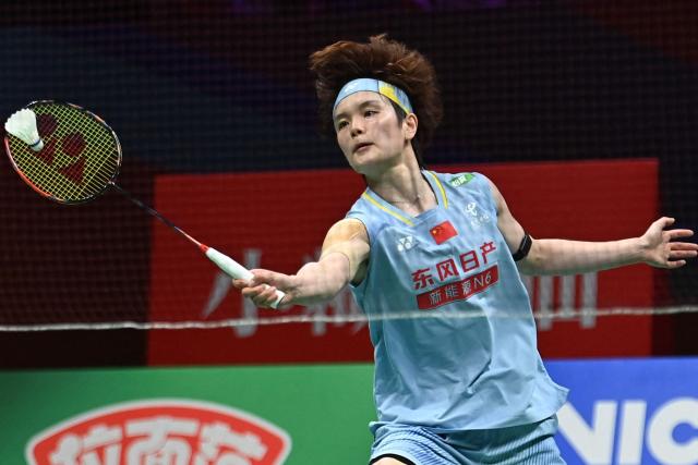 China's Wang Zhiyi hits a return to South Korea's An Se-young during their women's singles final match at the Badminton Asia Championship in Ningbo, eastern China's Zhejiang province on April 12, 2026. (Photo by CN-STR / AFP) / China OUT