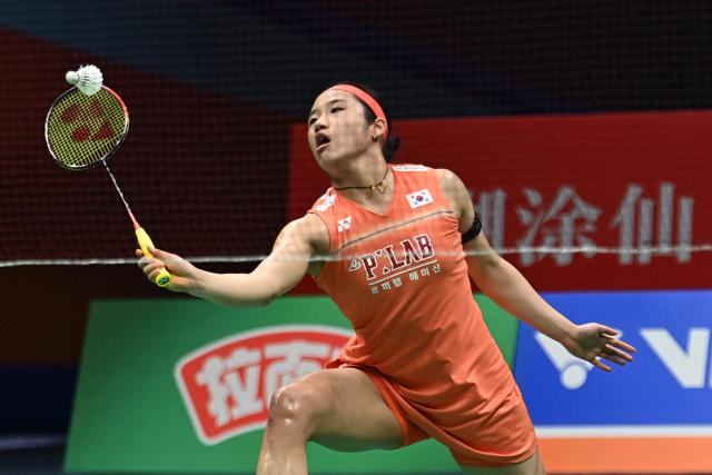 South Korea's An Se-young hits a return to China's Wang Zhiyi during their women's singles final match at the Badminton Asia Championship in Ningbo, eastern China's Zhejiang province on April 12, 2026. (Photo by CN-STR / AFP) / China OUT