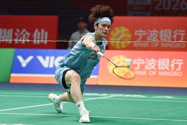 China's Wang Zhiyi hits a return to South Korea's An Se-young during their women's singles final match at the Badminton Asia Championship in Ningbo, eastern China's Zhejiang province on April 12, 2026. (Photo by CN-STR / AFP) / China OUT
