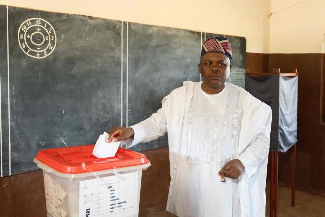 Presidential candidate Paul Hounkpe casts his ballot at a polling station in Lobogo on April 12, 2026 during Benin's presidential election. (Photo by Yanick Folly / AFP)