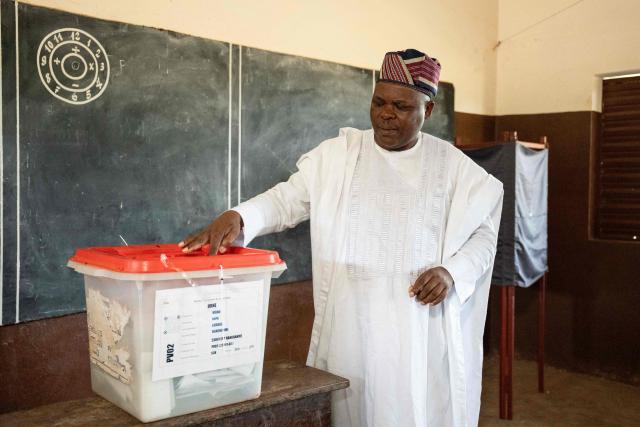 Presidential candidate Paul Hounkpe casts his ballot at a polling station in Lobogo on April 12, 2026 during Benin's presidential election. (Photo by Yanick Folly / AFP)