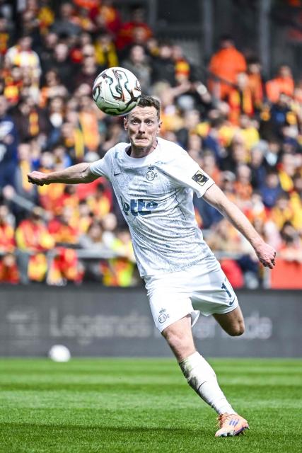 Mechelen's Belgian centre #16 Rob Schoofs runs for the ball  during the Belgian Pro League play-off football match between KV Mechelen and Royale Union Saint-Gilloise at the Achter de Kazerne stadium in Mechelen on April 12, 2026. (Photo by Tom Goyvaerts / Belga / AFP) / Belgium OUT