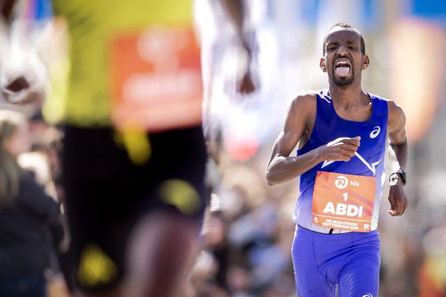 Belgium's  Bashir Abdi crosses the finish line of the men’s race of the 45th edition of the Rotterdam Marathon in Rotterdam on April 12, 2026. (Photo by Robin van Lonkhuijsen / ANP / AFP) / Netherlands OUT