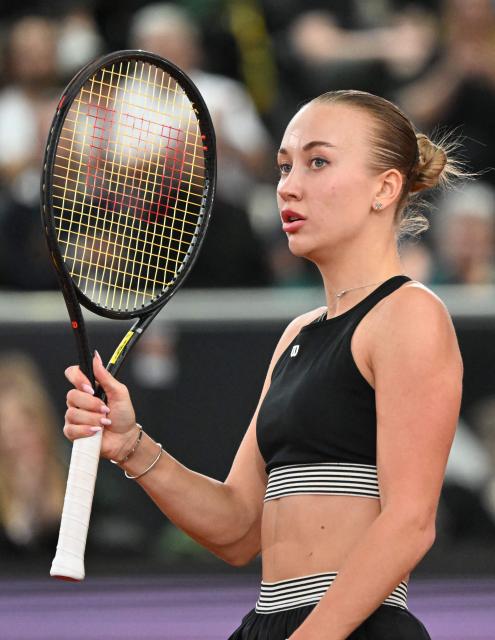 Austria's Anastasia Potapova reacts as she plays against Mirra Andreeva (not pictured) during their women's single final match of the WTA Upper Austria Women's Linz tennis tournament in Linz, Austria on April 12, 2026. (Photo by BARBARA GINDL / APA / AFP) / Austria OUT