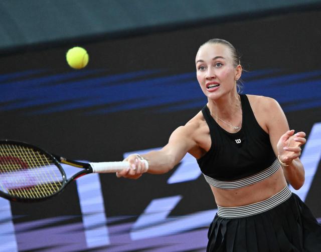 Austria's Anastasia Potapova returns the ball to Mirra Andreeva (not pictured) during their women's single final match of the WTA Upper Austria Women's Linz tennis tournament in Linz, Austria on April 12, 2026. (Photo by BARBARA GINDL / APA / AFP) / Austria OUT